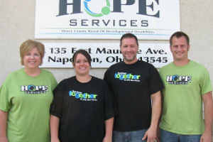 Volunteers for Hope Services smiling