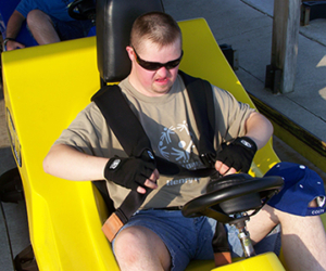 Young adult in go-cart