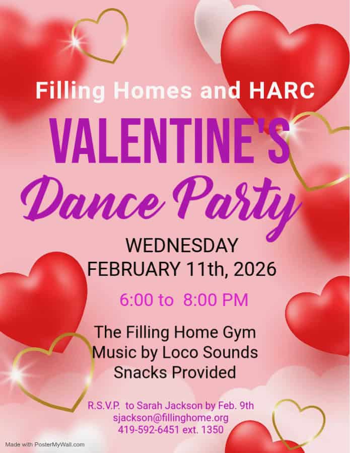 Adults enjoying Valentine's Dance Party at Filling Homes gym with hearts and music.