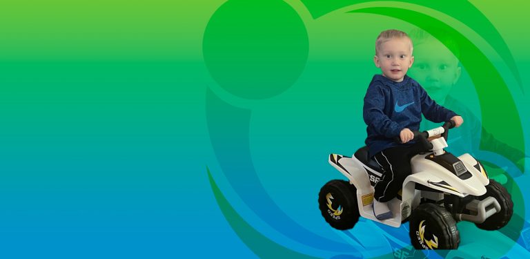 Little boy on a 4 wheeler