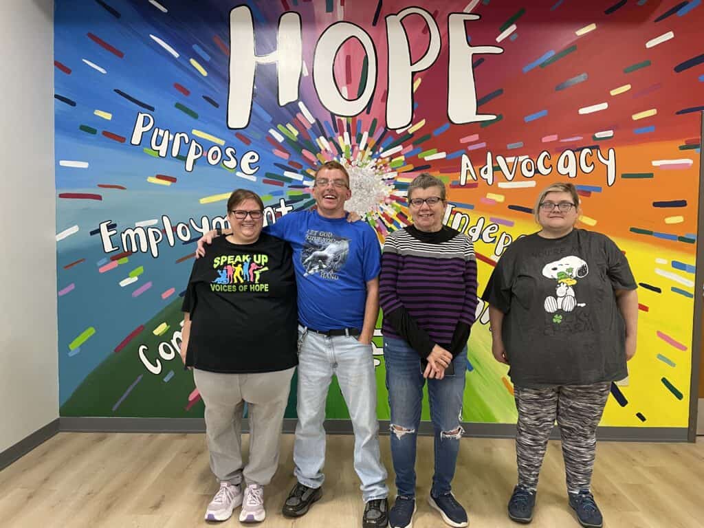 Photo of 4 individuals that volunteer to be officers in Voices of HOPE
